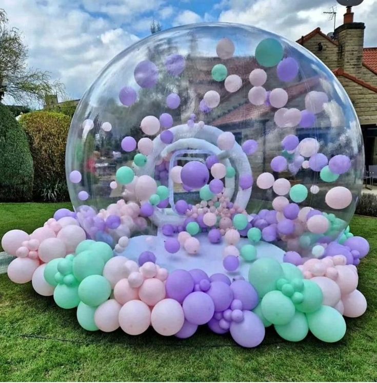 An elegant balloon garland decorating a bubble house